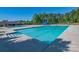 Inviting community pool with a waterslide and plenty of lounge space at 12434 Kemerton Ln, Huntersville, NC 28078