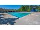 Community lap pool with adjacent playground equipment at 12434 Kemerton Ln, Huntersville, NC 28078