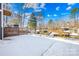 Backyard with snow, lake view, and modern wooden fence at 126 Abbey Ln, Mount Gilead, NC 27306