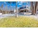 Modern lake house with deck and snow-covered yard at 126 Abbey Ln, Mount Gilead, NC 27306