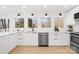 Modern kitchen featuring white cabinets and stainless steel appliances at 126 Abbey Ln, Mount Gilead, NC 27306