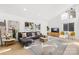 Bright living room with contemporary decor, vaulted ceilings and natural light at 126 Abbey Ln, Mount Gilead, NC 27306