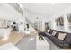 Bright, open concept living room with light wood flooring and a spacious feel at 126 Abbey Ln, Mount Gilead, NC 27306