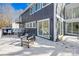 Covered patio with seating area and snow on the ground at 126 Abbey Ln, Mount Gilead, NC 27306