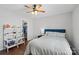 Well-lit bedroom with a full bed and closet access at 13303 Hyperion Hills Ln, Charlotte, NC 28278