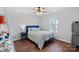 Charming bedroom with a full bed and plenty of storage at 13303 Hyperion Hills Ln, Charlotte, NC 28278