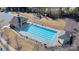 Community lap pool with pavilion and surrounding area at 13303 Hyperion Hills Ln, Charlotte, NC 28278