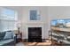 Living room fireplace with a modern mantel and black insert at 13303 Hyperion Hills Ln, Charlotte, NC 28278