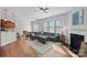 Bright and airy living room with hardwood floors and ample natural light at 13303 Hyperion Hills Ln, Charlotte, NC 28278