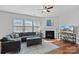 Cozy living room featuring a fireplace and comfortable seating at 13303 Hyperion Hills Ln, Charlotte, NC 28278