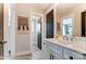 Clean bathroom with a modern vanity, mirror, and stylish wall decoration at 136 Longwood Rd # 47, Mooresville, NC 28115