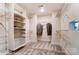 Spacious walk-in closet with custom shelving and ample storage space for organization at 136 Longwood Rd # 47, Mooresville, NC 28115