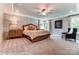 Relaxing main bedroom featuring elegant molding and a large bed with stylish decor at 136 Longwood Rd # 47, Mooresville, NC 28115