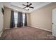 Spacious bedroom with ceiling fan and neutral carpeting at 138 Augusta Ln, Shelby, NC 28150