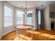 Bright dining area with a charming round table and hardwood floors at 138 Augusta Ln, Shelby, NC 28150