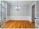 Formal dining room featuring hardwood floors and wainscoting at 138 Augusta Ln, Shelby, NC 28150