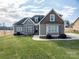 Craftsman style home with stone accents and a landscaped lawn at 138 Augusta Ln, Shelby, NC 28150