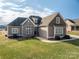 Two-story home with brown siding and stone accents at 138 Augusta Ln, Shelby, NC 28150