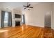 Living room with hardwood floors, fireplace, and high ceilings at 138 Augusta Ln, Shelby, NC 28150