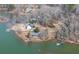 Aerial view of waterfront home with lake access and dock at 1408 Gaither Rd, Belmont, NC 28012