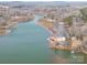 Aerial view of waterfront property, showcasing the home and surrounding area at 1408 Gaither Rd, Belmont, NC 28012