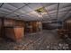 Unfinished basement with wood paneling and bar area at 1408 Gaither Rd, Belmont, NC 28012