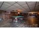 Spacious basement with billiard table, bar, and game area at 1408 Gaither Rd, Belmont, NC 28012