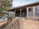 Lakefront porch with ornate railing and partial lake view at 1408 Gaither Rd, Belmont, NC 28012