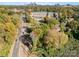 Aerial view showing a land lot near West Boulevard and Beechnut Road, with city skyline in the distance at 1817 West Blvd, Charlotte, NC 28208