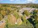 Aerial view of a land lot near West Boulevard and Beechnut Road, with city skyline in the distance at 1817 West Blvd, Charlotte, NC 28208