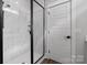 Bathroom featuring modern walk-in shower with glass enclosure and tiled walls at 1846 Yardley St, Rock Hill, SC 29732