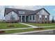 Attractive single-story home with stone details, manicured lawn, and inviting red front door at 1846 Yardley St, Rock Hill, SC 29732