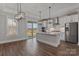 Modern kitchen featuring stainless steel appliances, white cabinets, and large center island at 1846 Yardley St, Rock Hill, SC 29732