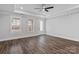 Bright main bedroom featuring hardwood floors, ample natural light, and elegant finishes at 1846 Yardley St, Rock Hill, SC 29732