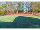 Large grassy backyard with a partially fenced perimeter at 2008 Fallondale Rd, Waxhaw, NC 28173