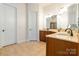 Elegant bathroom with double vanity and tiled floors at 2008 Fallondale Rd, Waxhaw, NC 28173