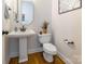 Small powder room with pedestal sink and toilet at 2008 Fallondale Rd, Waxhaw, NC 28173