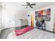 Bedroom with large wall tapestry and ceiling fan at 2008 Fallondale Rd, Waxhaw, NC 28173