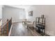 Upper hallway with sitting area and wood floors at 2008 Fallondale Rd, Waxhaw, NC 28173