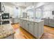 Modern kitchen with granite countertops, stainless steel appliances, and an island at 2008 Fallondale Rd, Waxhaw, NC 28173