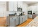 Modern kitchen with granite countertops, stainless steel appliances, and an island at 2008 Fallondale Rd, Waxhaw, NC 28173