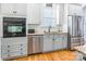 Modern kitchen with granite countertops, stainless steel appliances, and an island at 2008 Fallondale Rd, Waxhaw, NC 28173