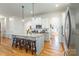 Bright kitchen with granite countertops and island seating at 2008 Fallondale Rd, Waxhaw, NC 28173