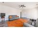 Living room with two sofas and orange rug at 2008 Fallondale Rd, Waxhaw, NC 28173