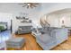 Spacious living room featuring a sectional sofa and hardwood floors at 2008 Fallondale Rd, Waxhaw, NC 28173