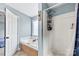 Bathroom with soaking tub, shower, and wood accents at 214 Heather Glen Ln, Belmont, NC 28012