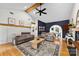 Living room with vaulted ceiling, fireplace, and hardwood floors at 214 Heather Glen Ln, Belmont, NC 28012