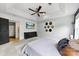 Main bedroom featuring a large TV and stylish decor at 214 Heather Glen Ln, Belmont, NC 28012