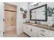 Modern bathroom with granite countertop, white cabinets, and a walk-in shower at 217 Ridge Reserve Dr, Lake Wylie, SC 29710