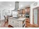 Modern kitchen with granite island and stainless steel appliances at 217 Ridge Reserve Dr, Lake Wylie, SC 29710